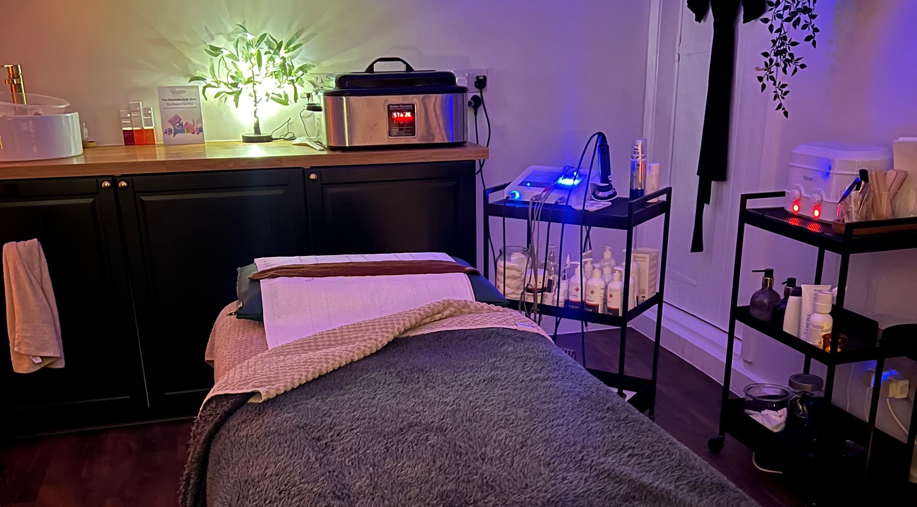 Cozy spa room at Samantha Joyce Beauty, Basingstoke, England, GB featuring a massage bed and calming decor.
