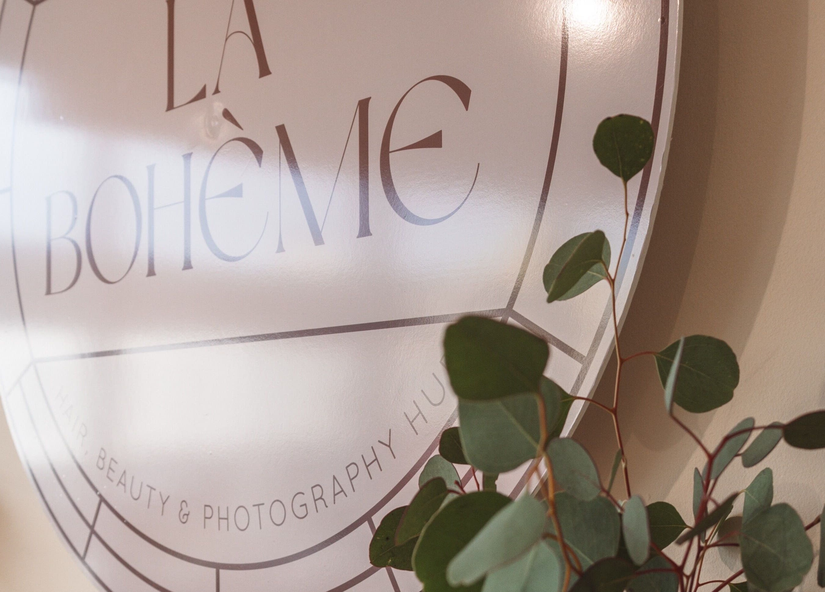 La Bohème Hub's elegant sign with plant decor in Lisburn, Northern Ireland, GB.