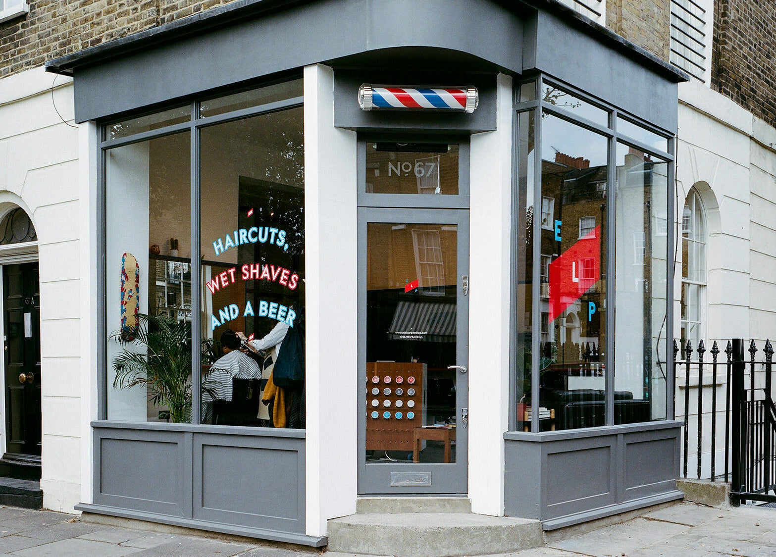 Street view of ELP Barbershop in London, England, GB showcasing stylish modern exterior.