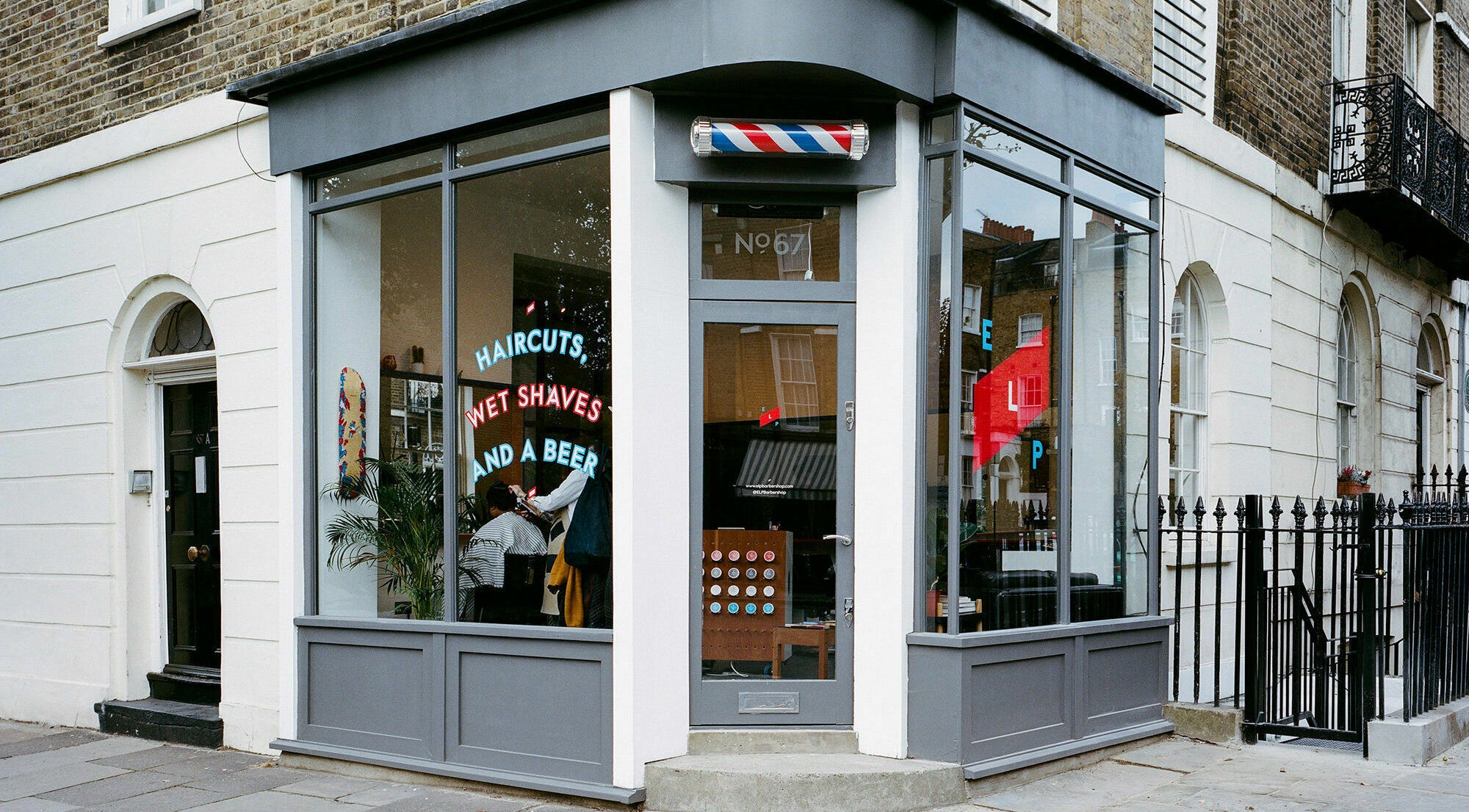 Street view of ELP Barbershop in London, England, GB showcasing stylish modern exterior.
