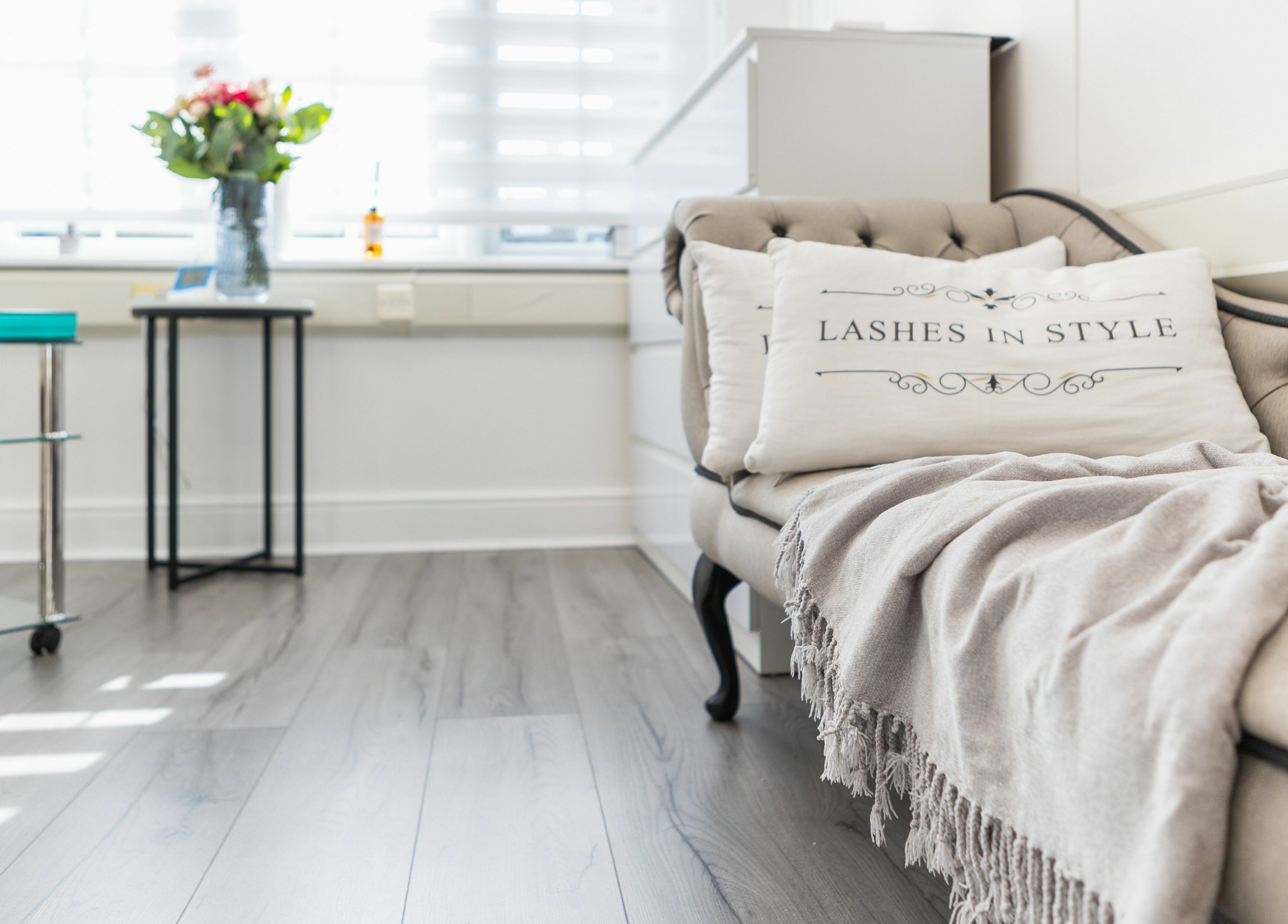 Elegant Lashes In Style salon interior with cozy seating in London, England, GB.