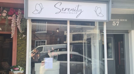 Exterior of Serenity Hair & Beauty in Alcester, England, GB featuring elegant floral design.