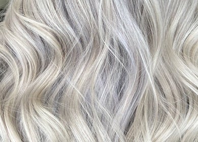 Elegant silver-blonde waves styled at Serenity Hair & Beauty, Alcester, England, GB.