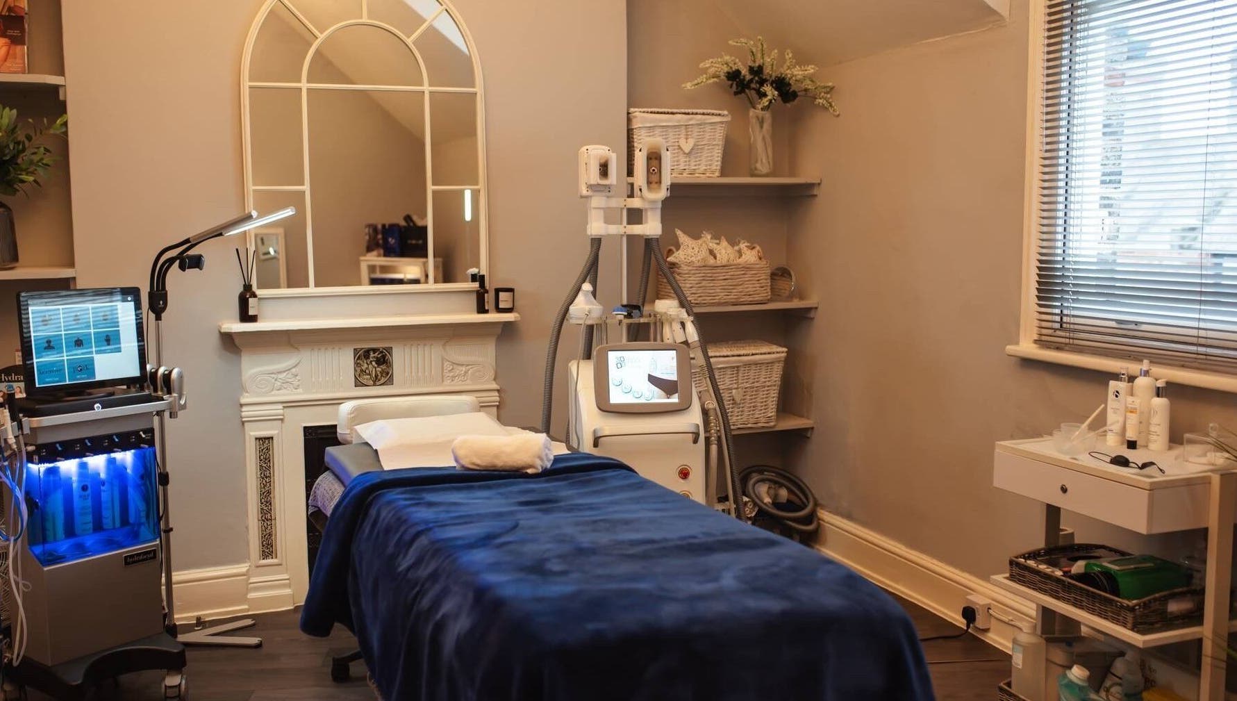 Calming treatment room at Bute House Aesthetics, Newmarket, England, GB featuring a modern facial machine.