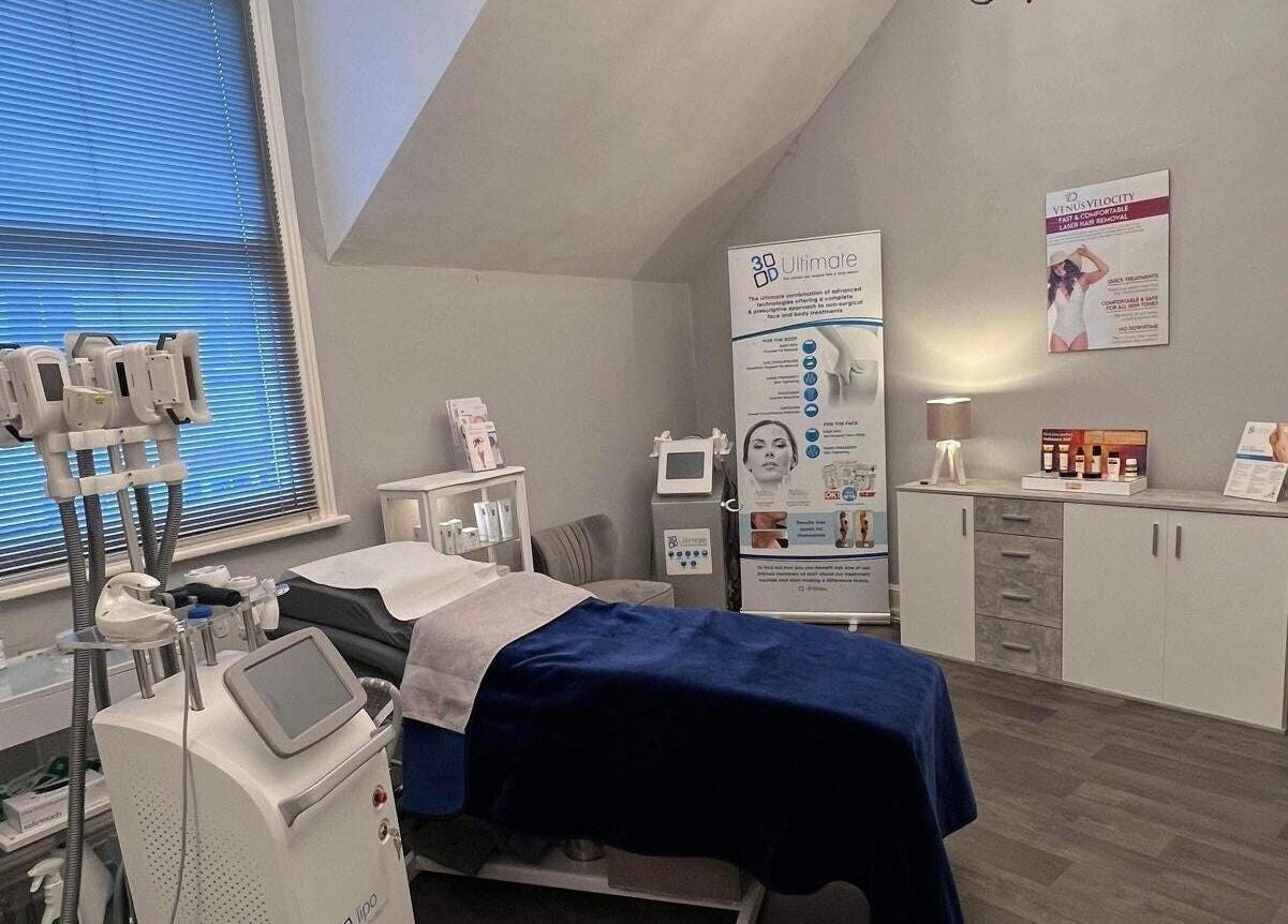 Relaxing treatment room at Bute House Aesthetics in Newmarket, England, featuring modern beauty equipment.