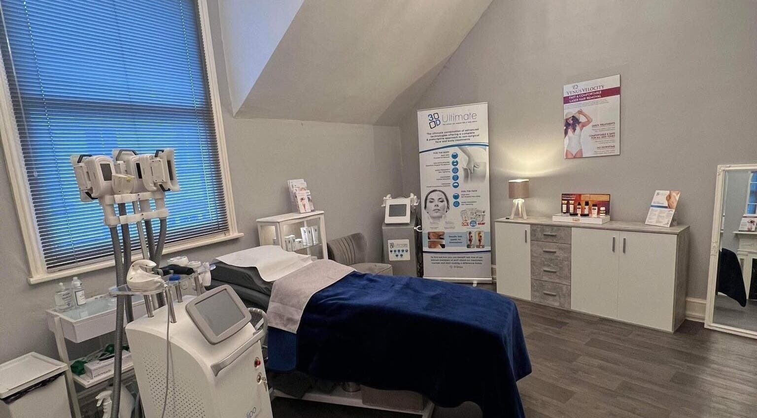Relaxing treatment room at Bute House Aesthetics in Newmarket, England, featuring modern beauty equipment.
