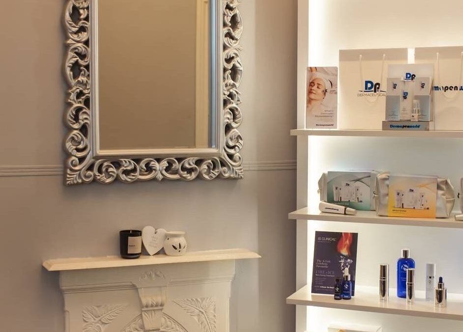 Elegant product display and ornate mirror at Bute House Aesthetics, Newmarket, England, GB.