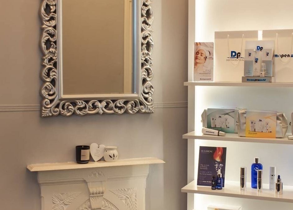 Elegant product display and ornate mirror at Bute House Aesthetics, Newmarket, England, GB.