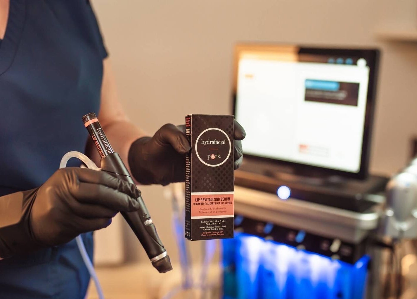 Professional using serum at Bute House Aesthetics, Newmarket, England, GB for advanced skincare treatment.