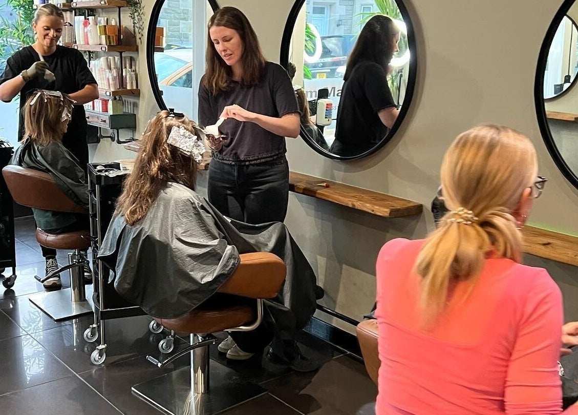 Stylists working at Calum Maguire Hairdressing, Ayr, Scotland, GB, offering professional salon services.