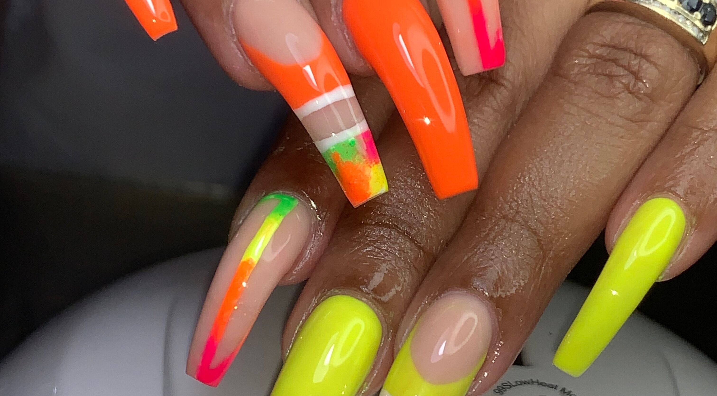 Vibrant neon nail designs at Head 2 Toes Beauty Palace in Bridgetown, Saint Michael, BB.