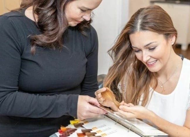 Client receiving a personalized hair color consultation at Erin’s Hair Design, Bradford West Gwillimbury, Ontario, CA.