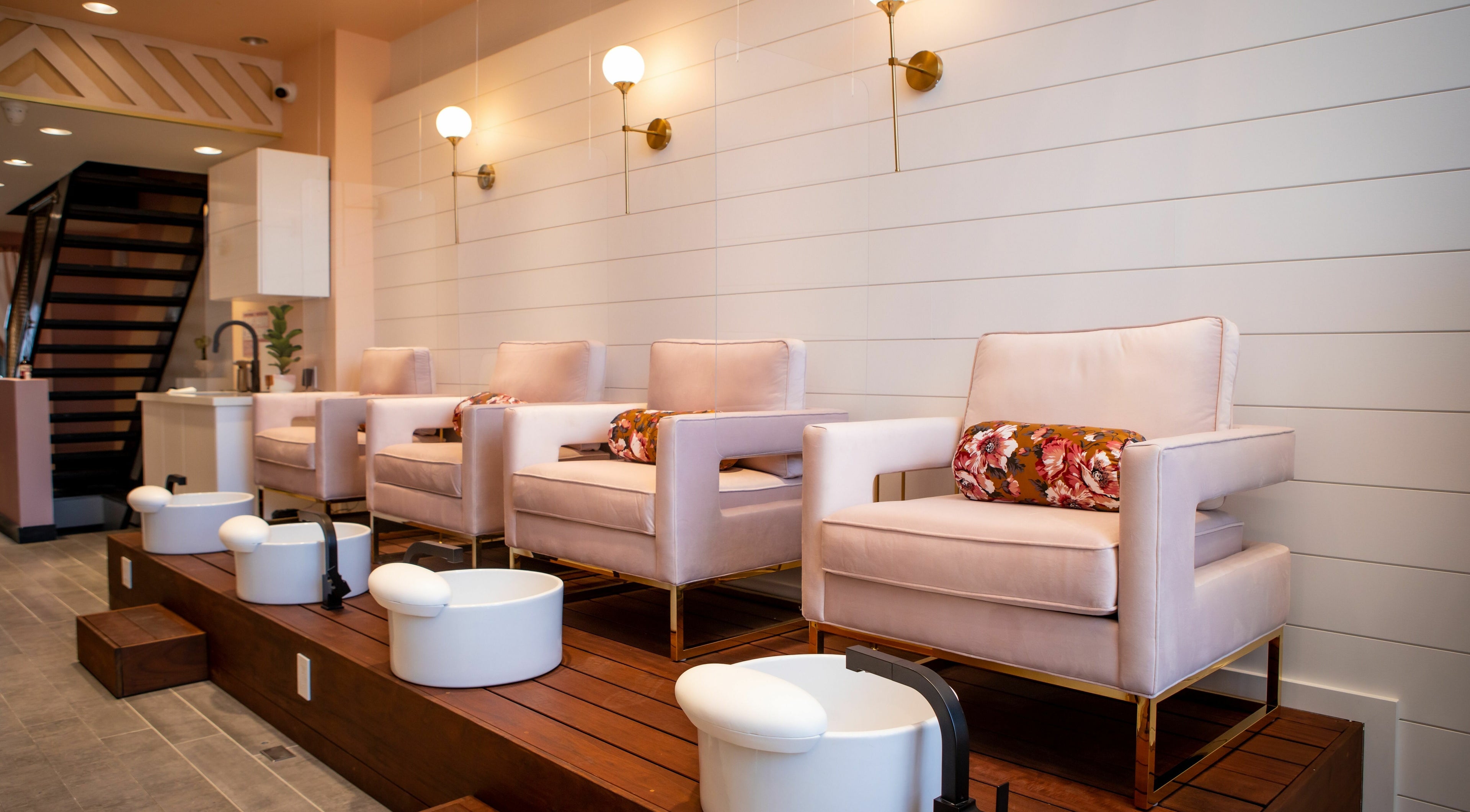Luxurious nail treatment chairs at Kuko House, Toronto, Ontario, CA, offering a premium spa experience.