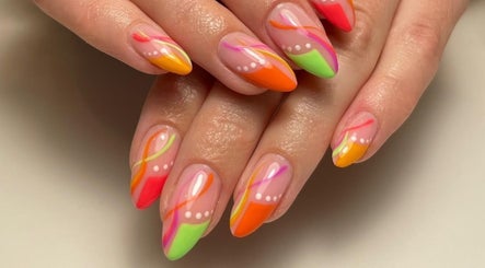 Colorful nail art at Nanda Nails & Beauty, Bay Of Plenty, NZ showcasing intricate designs and vibrant hues.