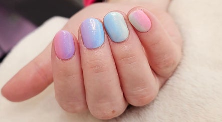 Pastel nail art at The Nail And Beauty Shed in Bryngwran, Cymru, GB showcasing trendy gradient hues.