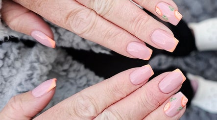 Elegant peach-tipped nails at The Nail And Beauty Shed, Bryngwran, Cymru, GB, showcasing intricate nail art.