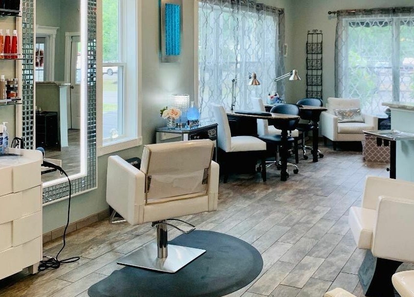 Bright and inviting interior of Skin Deep Day Spa in Cumberland, Maine, US, showcasing modern styling stations.