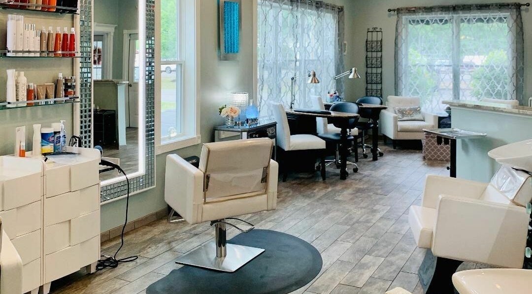 Bright and inviting interior of Skin Deep Day Spa in Cumberland, Maine, US, showcasing modern styling stations.