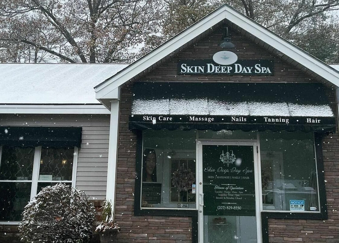 Skin Deep Day Spa entrance in snowy Cumberland, Maine, US, showcasing beauty and wellness services.