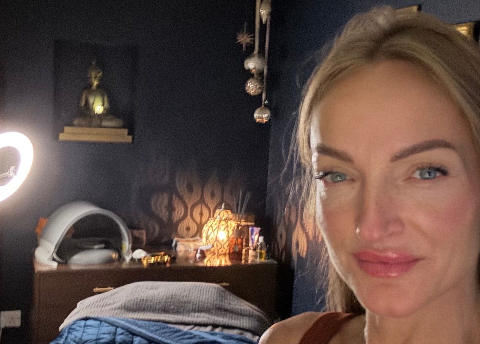 Relaxing beauty treatment room at Ritual in Glasgow, Scotland, GB with ambient lighting and decor.