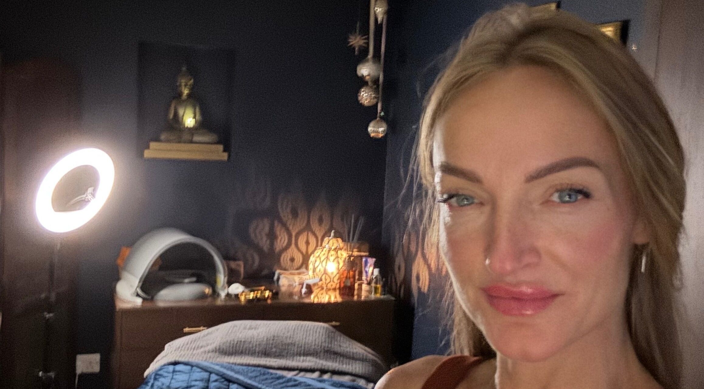 Relaxing beauty treatment room at Ritual in Glasgow, Scotland, GB with ambient lighting and decor.