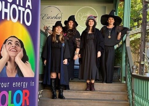 Oracle & Sage - 78 Spring Street hosts a vibrant event in Eureka Springs, Arkansas, US with women in witch costumes.