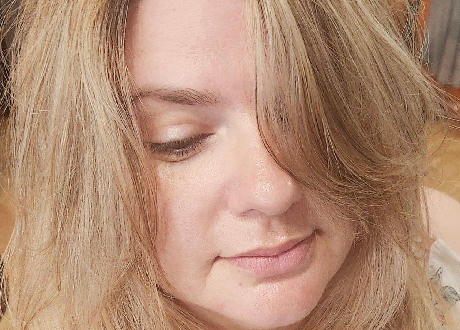 Client with soft blonde hairstyle at Rockin Rollers, Sierra Madre, California, US showcasing salon expertise.