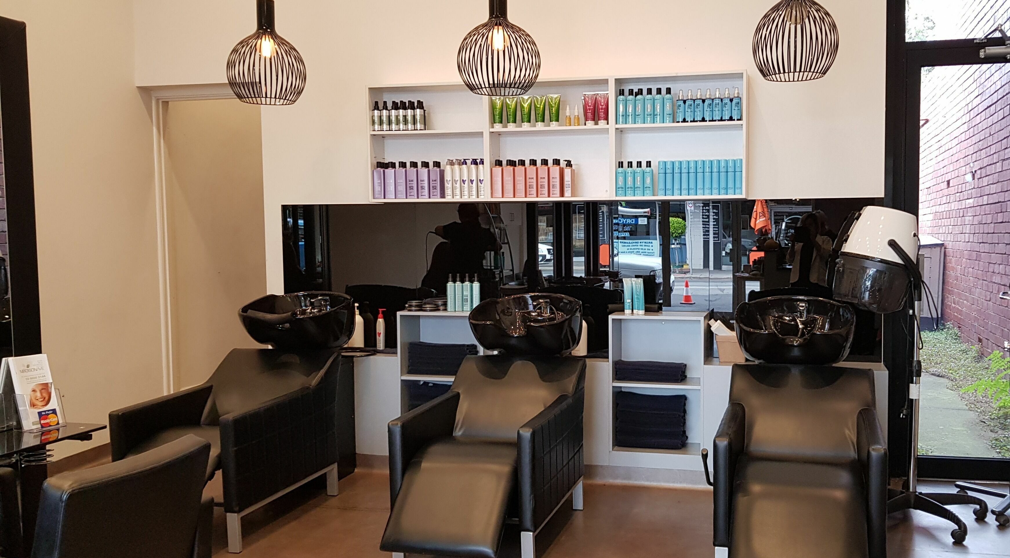 Sleek washing stations at Madison Ave Hair & Skin, Melbourne, Victoria, AU with modern decor and products.