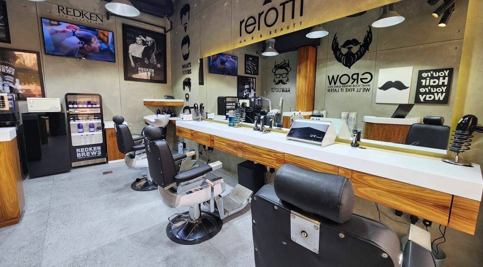 Modern interior of Rerotti Gents Salon Remraam in Dubai, AE with sleek barber chairs and stylish decor.