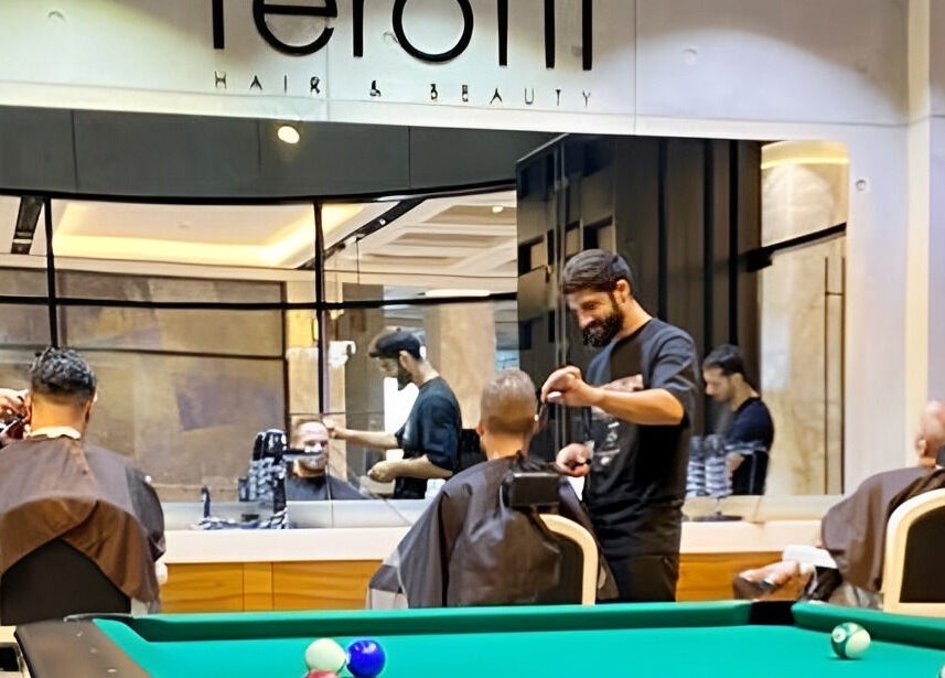 Professional barbers crafting styles at Rerotti Gents - Al Ghadeer, Abu Dhabi, Abu Dhabi, AE.