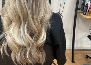 Blonde waves styled at Erin McQuitty Hair, Carrickfergus, England, GB, showcasing salon quality.