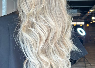Blonde wavy hair styled at Erin McQuitty Hair in Carrickfergus, England, GB.