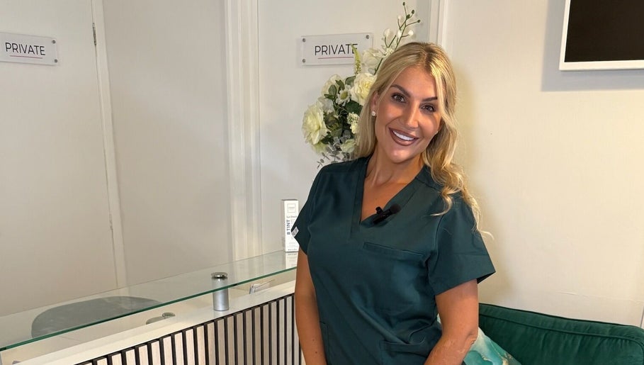 Friendly staff member at Rosalyn’s Medical Clinic, Wakefield, England, GB, ready to assist clients.