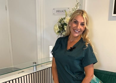 Friendly staff member at Rosalyn’s Medical Clinic, Wakefield, England, GB, ready to assist clients.