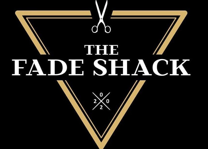 Logo of The Fade Shack Strandfontein in Cape Town, Western Cape, ZA featuring a stylized triangle with scissors.