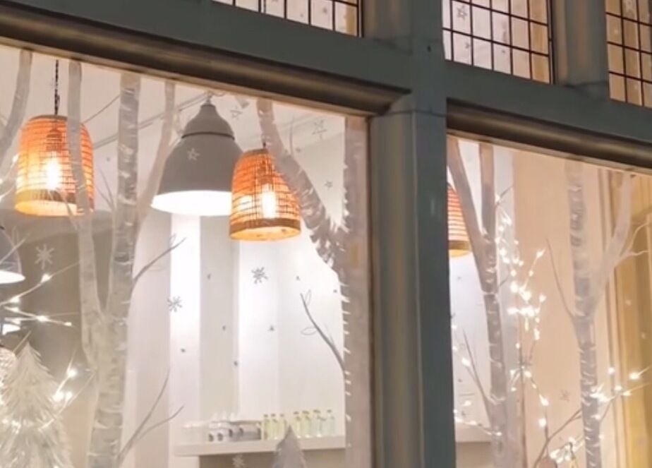 Cozy illuminated window at Sanctuary Eleven-Daisy Chains, Royal Leamington Spa, England, GB.