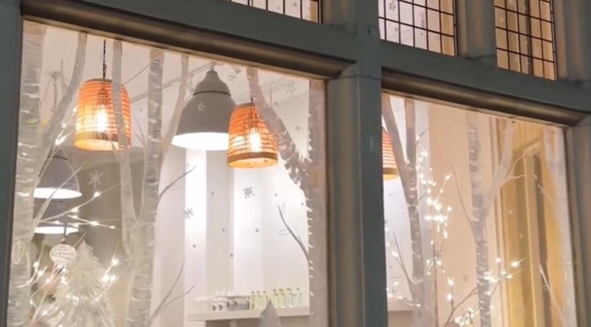 Cozy illuminated window at Sanctuary Eleven-Daisy Chains, Royal Leamington Spa, England, GB.