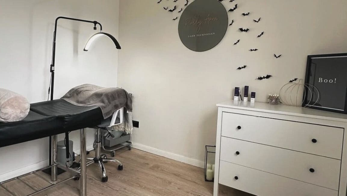 Polly Anna Lashes in Daventry, England, GB, features a cozy beauty room with modern decor and treatment table.