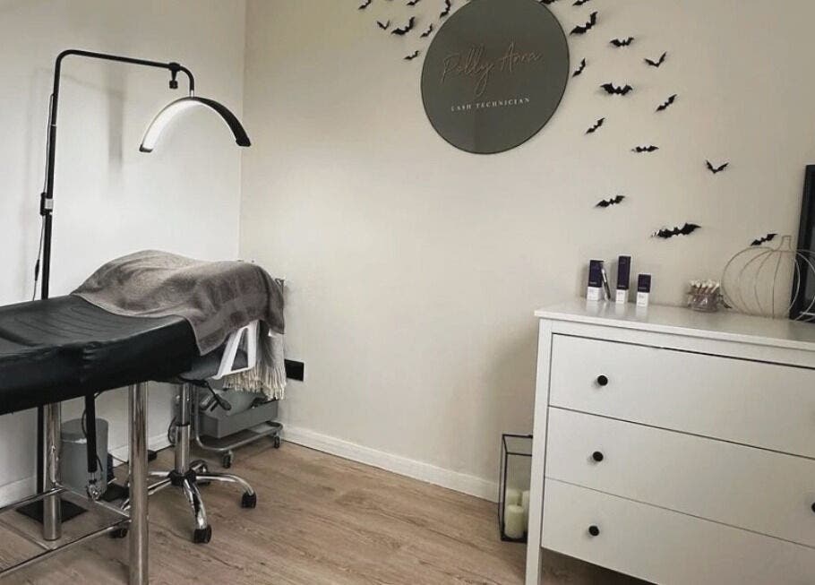 Polly Anna Lashes in Daventry, England, GB, features a cozy beauty room with modern decor and treatment table.