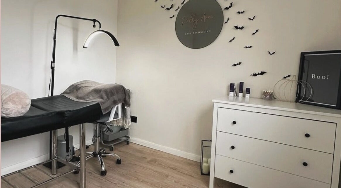 Polly Anna Lashes in Daventry, England, GB, features a cozy beauty room with modern decor and treatment table.