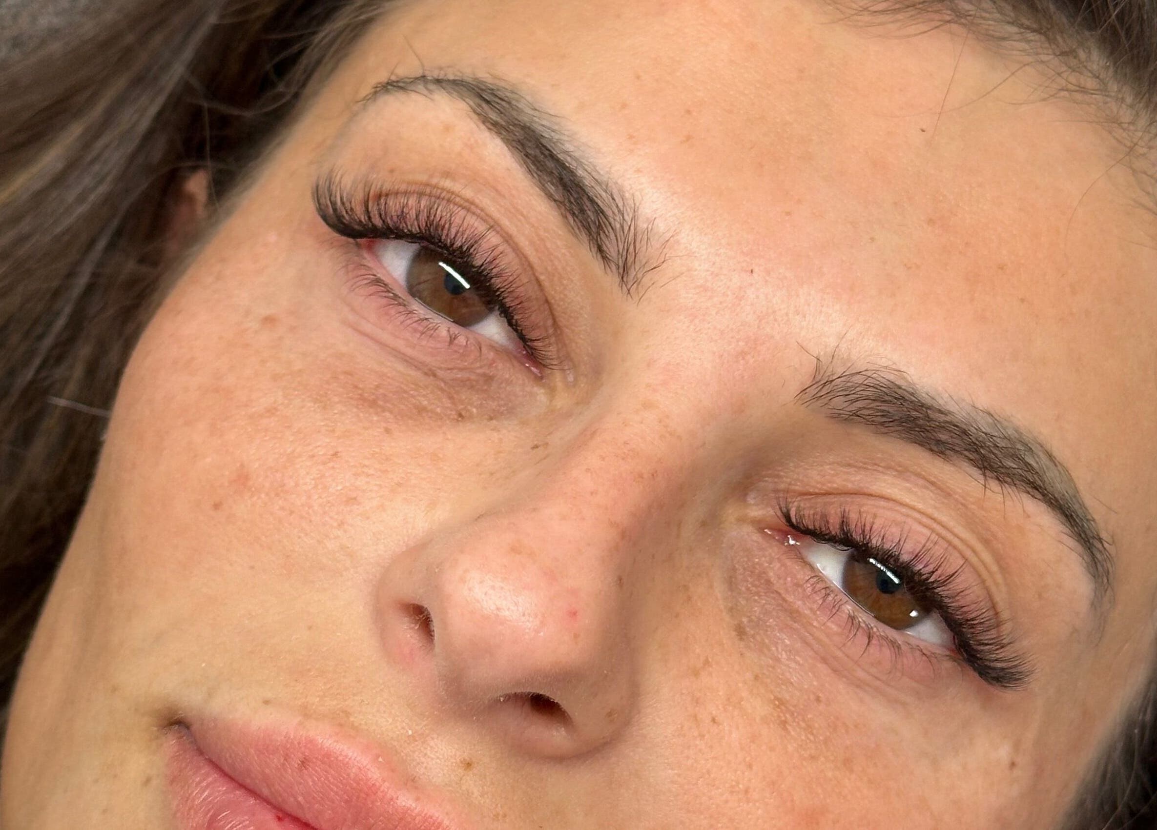 Close-up of enhanced eyelashes at Polly Anna Lashes, Daventry, England, GB showing expert application.