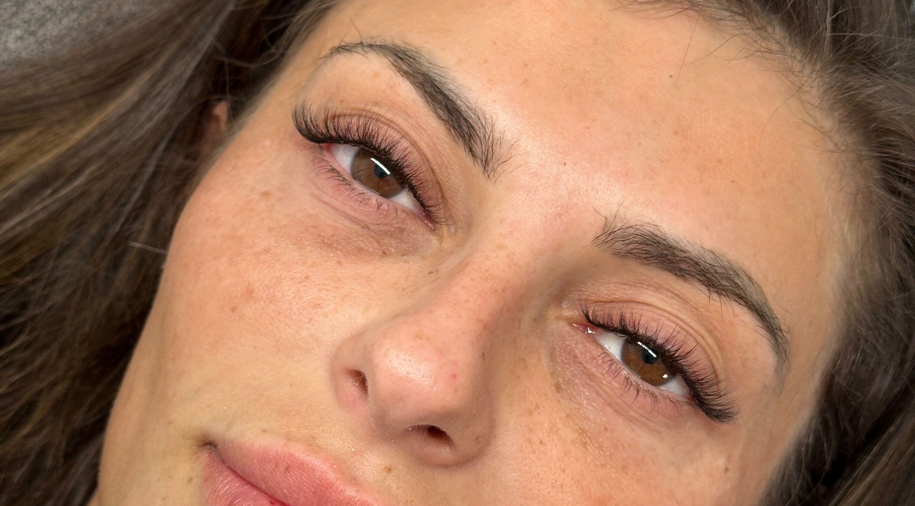 Close-up of enhanced eyelashes at Polly Anna Lashes, Daventry, England, GB showing expert application.