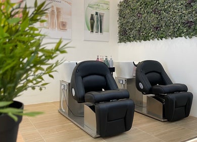 Modern salon chairs and lush decor at Fragrance Hair Saloon, Cheras, Selangor, MY.