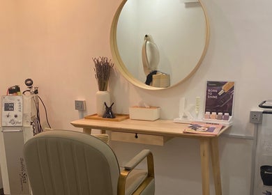 Modern salon chair and mirror at Fragrance Hair Saloon, Cheras, Selangor, MY, offering elegant beauty services.