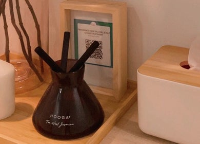 Serene decor at Fragrance Hair Saloon, Cheras, Selangor, MY, featuring candles and aroma diffuser.