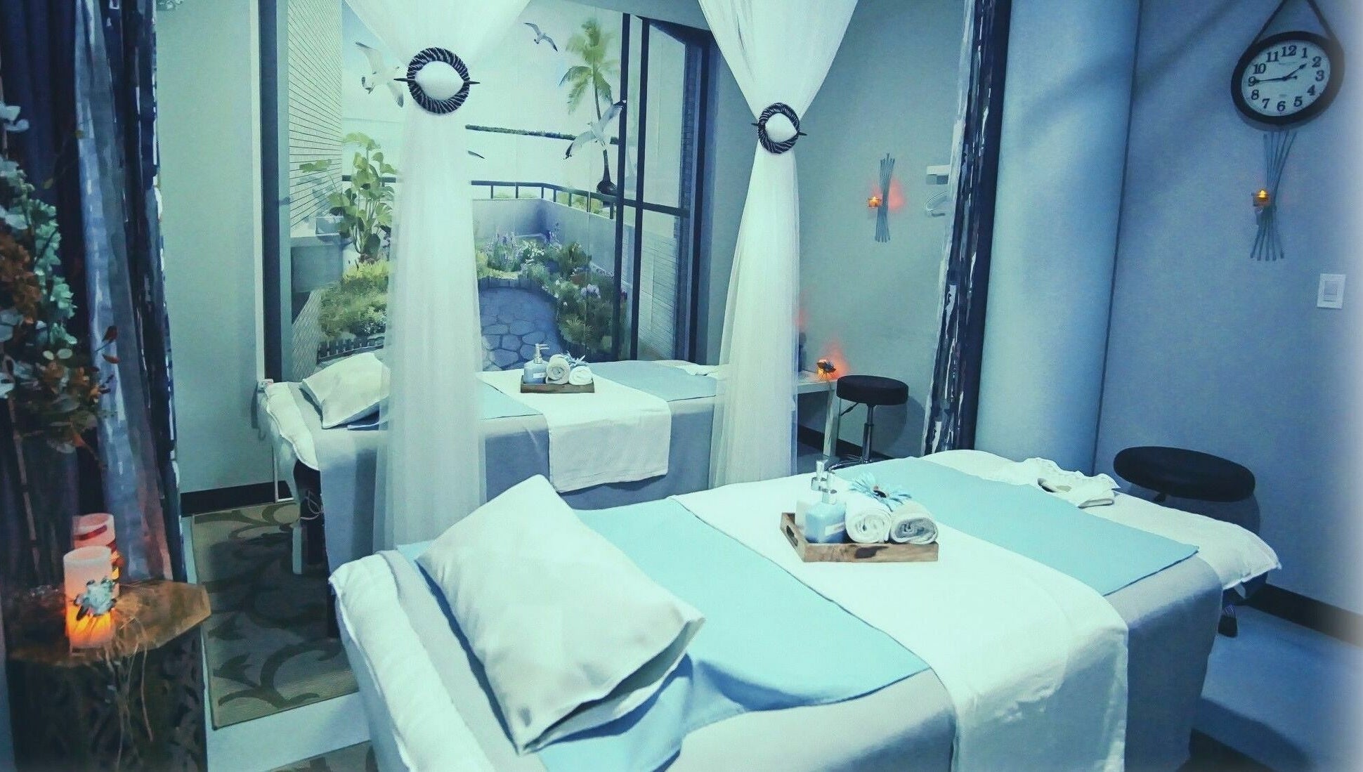 Luxurious massage room at Silver Sea Day Spa, San Jose, California, US featuring serene decor and plush treatment beds.