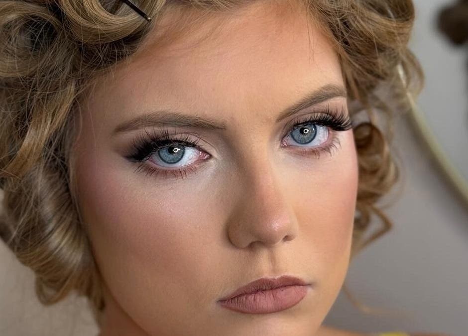 Close-up of elegant makeup and curls by Makeup and Glow by Fran, Daybrook, England, GB.