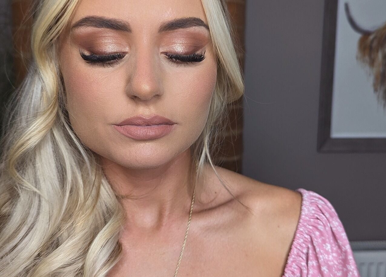 Elegant bridal makeup by Makeup and Glow by Fran in Daybrook, England, GB. Soft curls and natural tones.