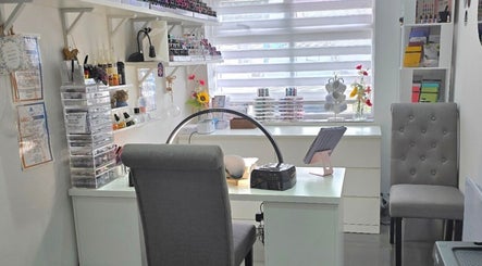 Elegant manicure station at Inspired Nails, Northbourne, England, GB, featuring modern decor and equipment.