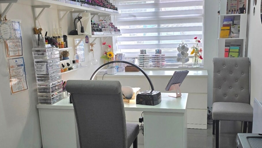 Inspired Nails studio interior showcasing nail polish displays in Northbourne, England, GB.